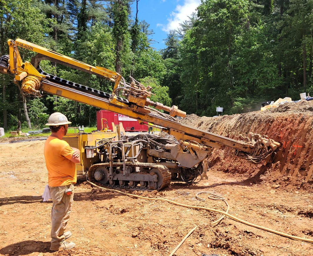 Installation of the top row of soil nails for the wall that is being constructed in the Lake Williams spillway area is currently underway.