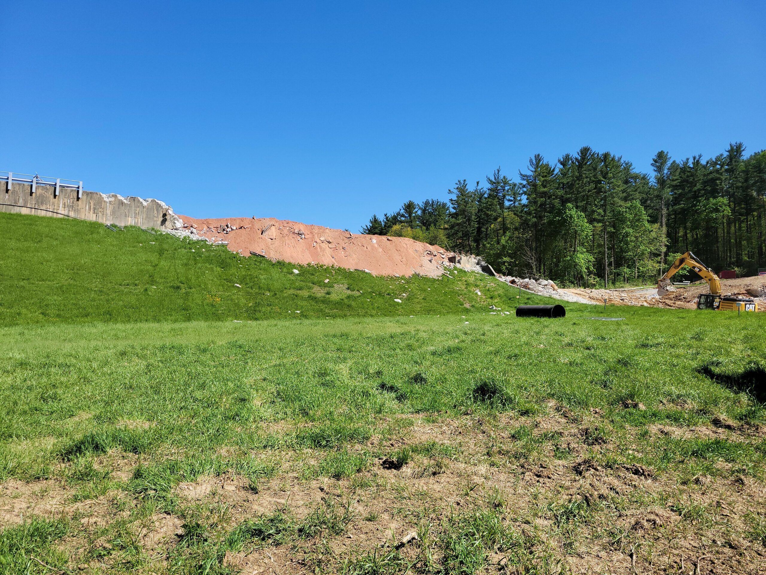 The roadway over Lake Williams Dam has been removed. Excavation of the bedrock in the spillway will take place over the next several months.