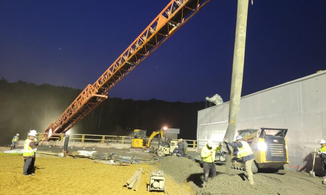 Pouring concrete at night for the Lake Williams Dam.