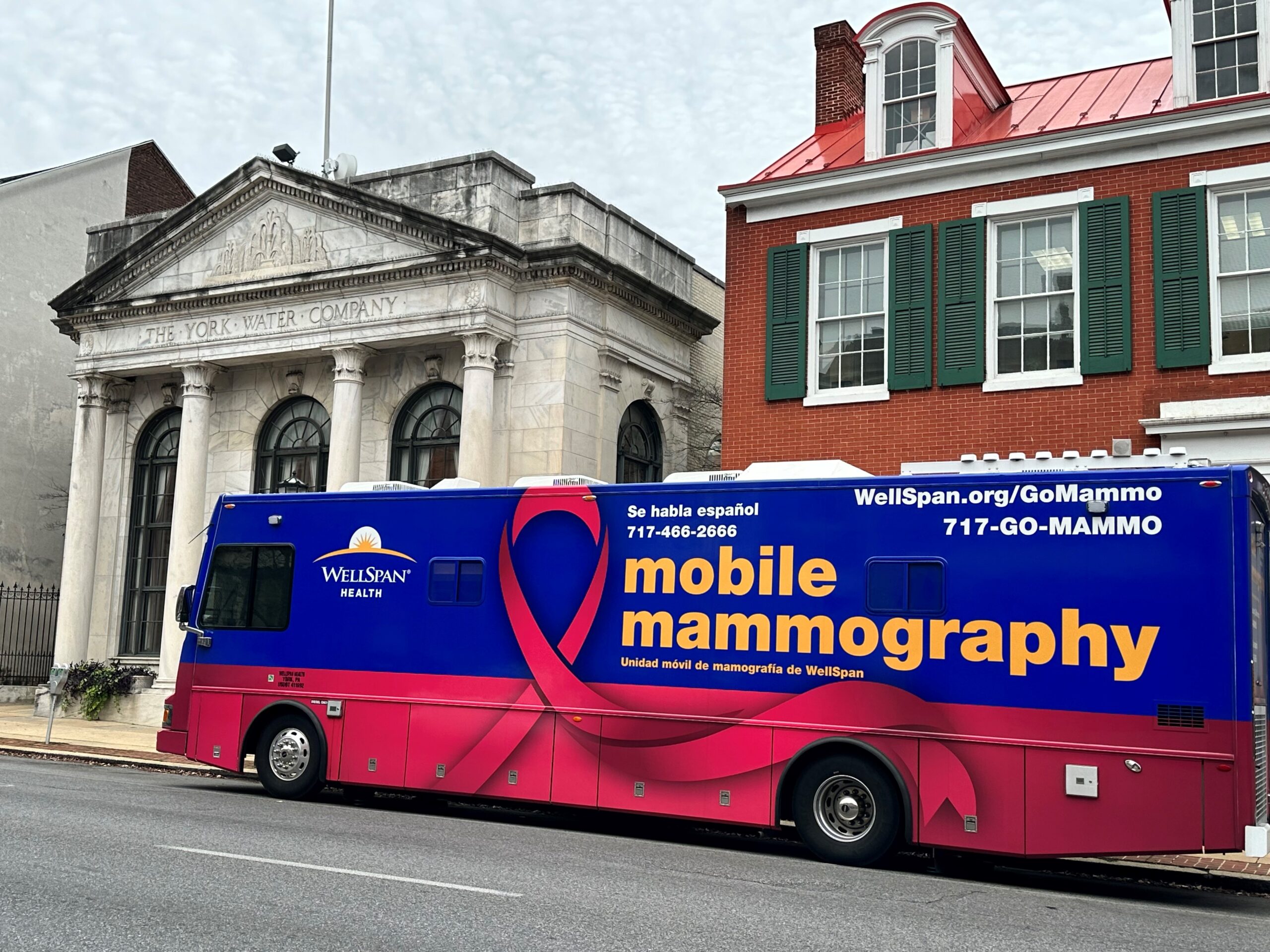 The WellSpan Mobile Mammography bus is parked in front of the York Water Company building.