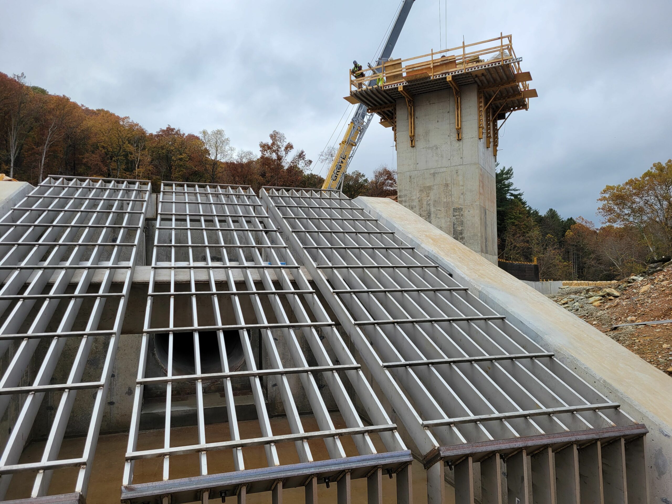 Stainless steel bar screen being installed.