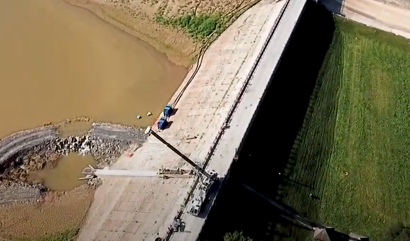 An aerial image of the Lake Williams Dam spillway. It that Phase 1 of the Lake Williams Dam Project is complete.