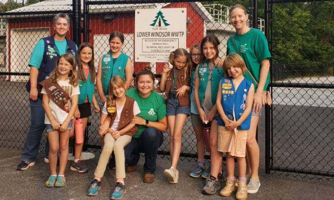 A Girl Scout troop poses for a group photo after a field trip at a York Water Company wastewater treatment plant.