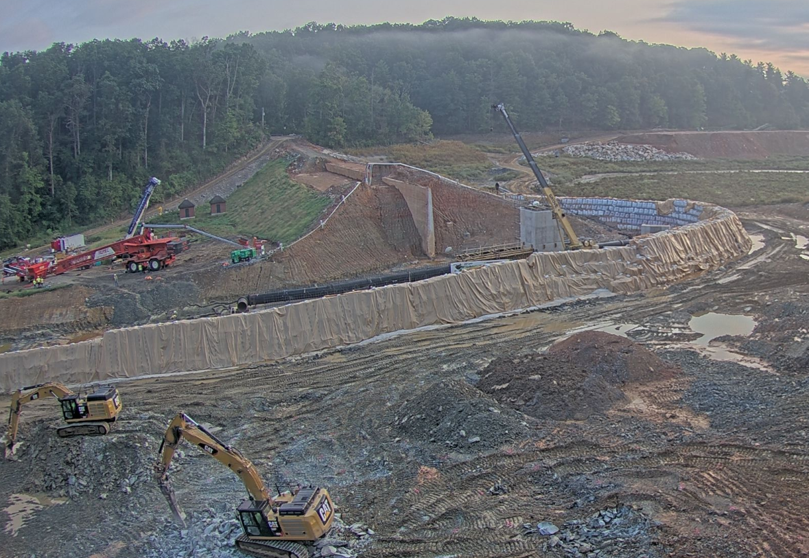 The new Lake Williams Dam valve tower’s second lift has been poured and the 48” diameter ductile iron outlet pipe is now visible behind the cofferdam.