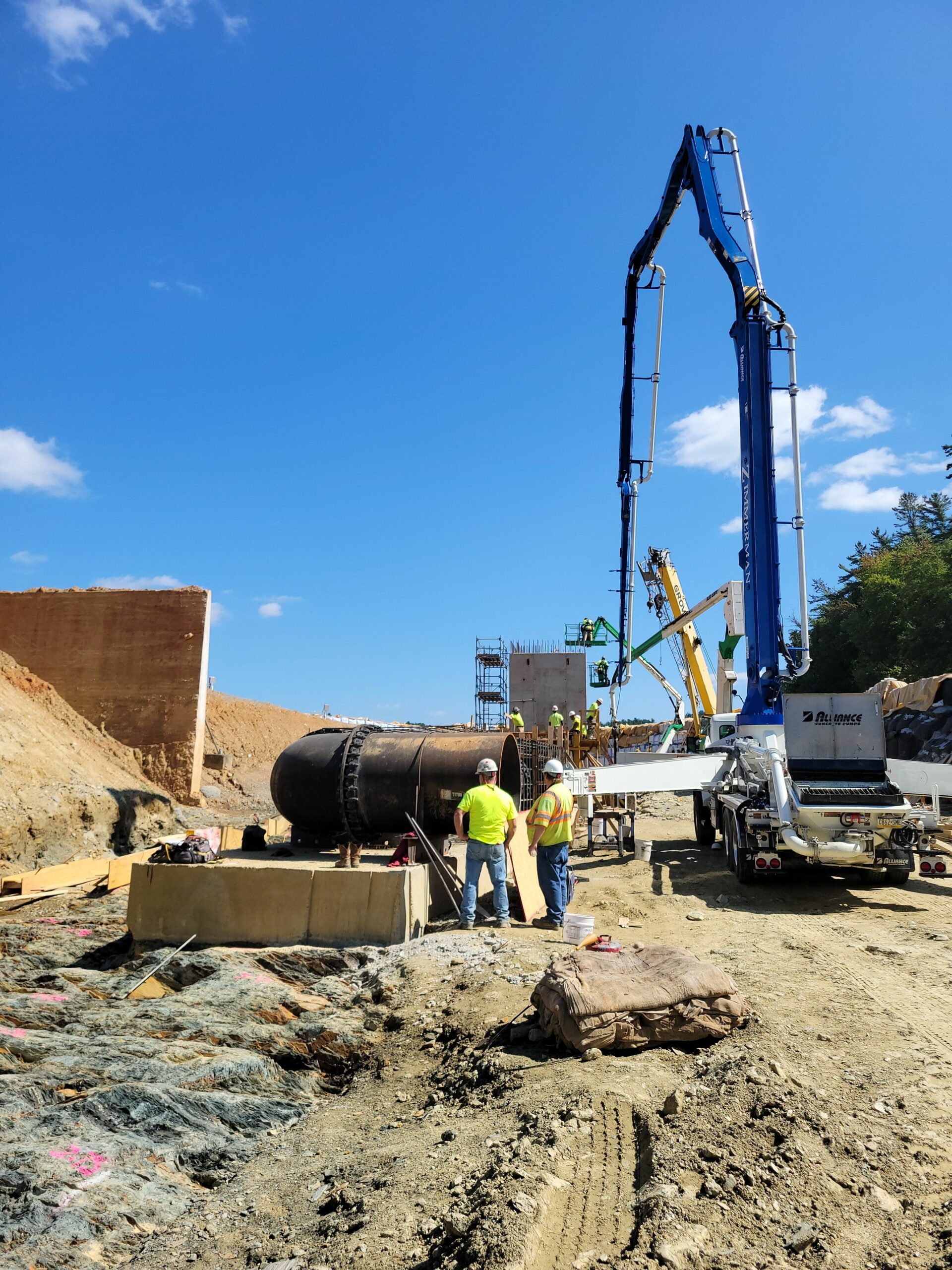 Preparation to pour concrete in the outlet pipe encasement formwork on the bottom of Lake Williams is taking place.
