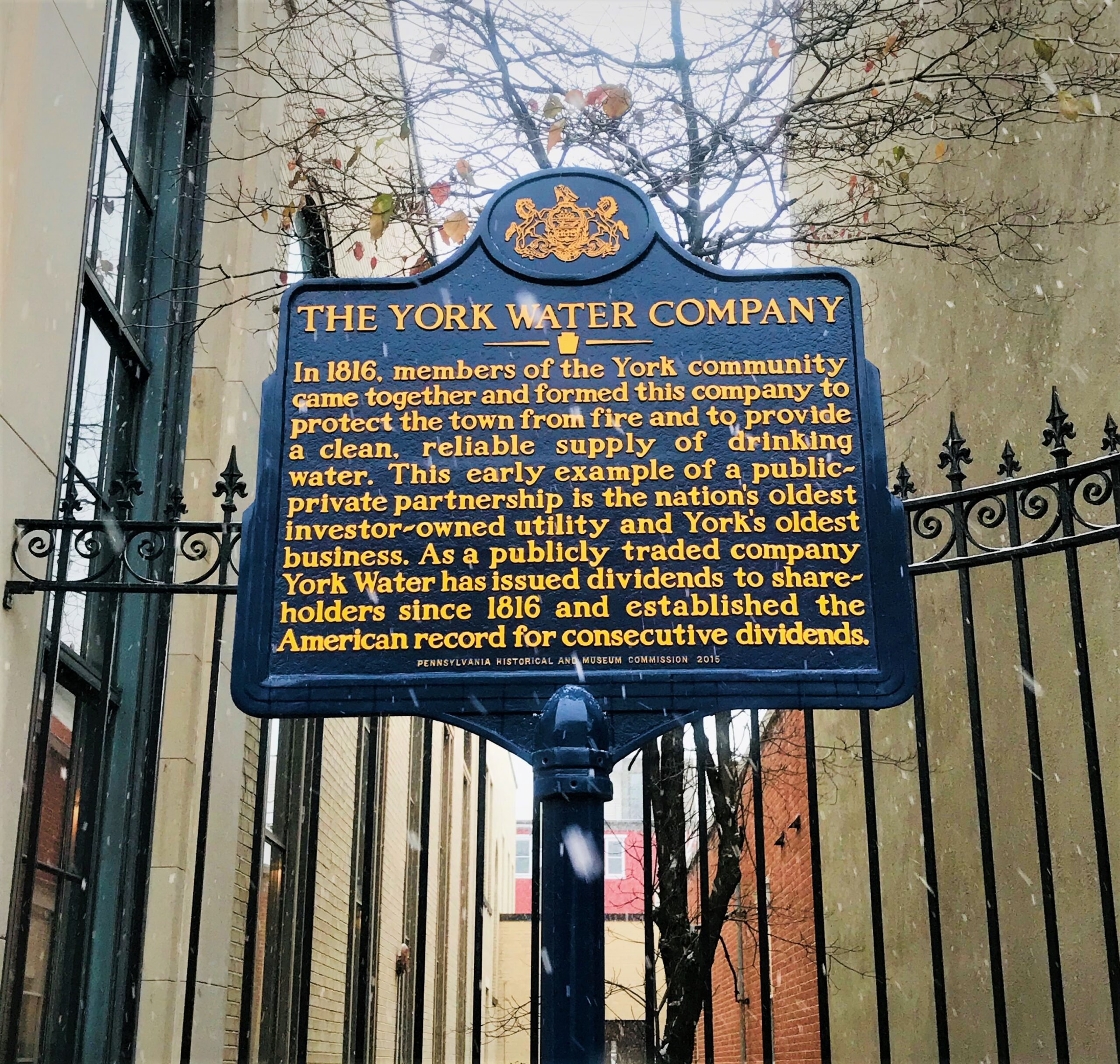 Image of a historical marker sign to advise the York Water was established in 1816 and is the oldest listed company I USA.
